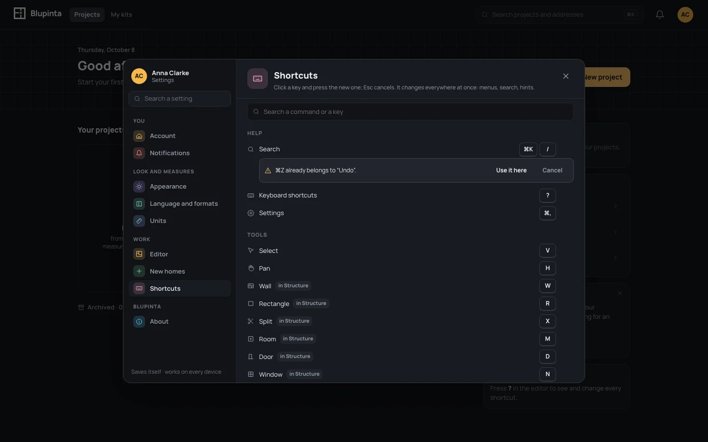 A key already used by another command: the editor asks before moving it